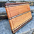 A beautiful cherry cutting board with maple and walnut inlays.