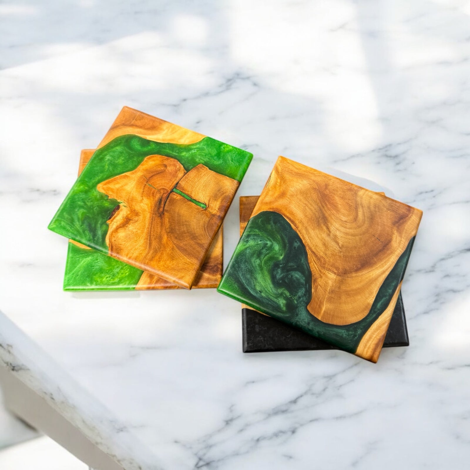 Maple Burl Coasters with a melting green river. the river starts bright green and flows to black.