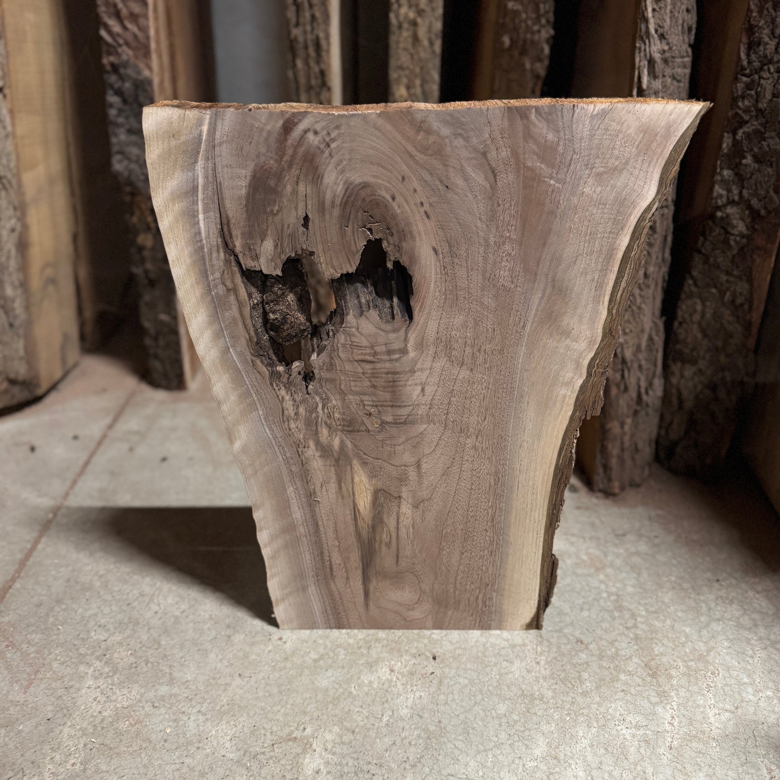 Full of character live edge walnut slab.