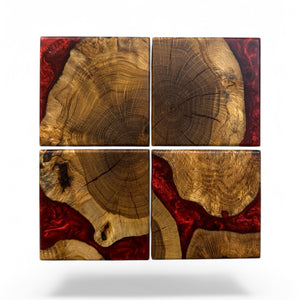 Oak Burl Coasters with Dragon Resin sitting with a white background.