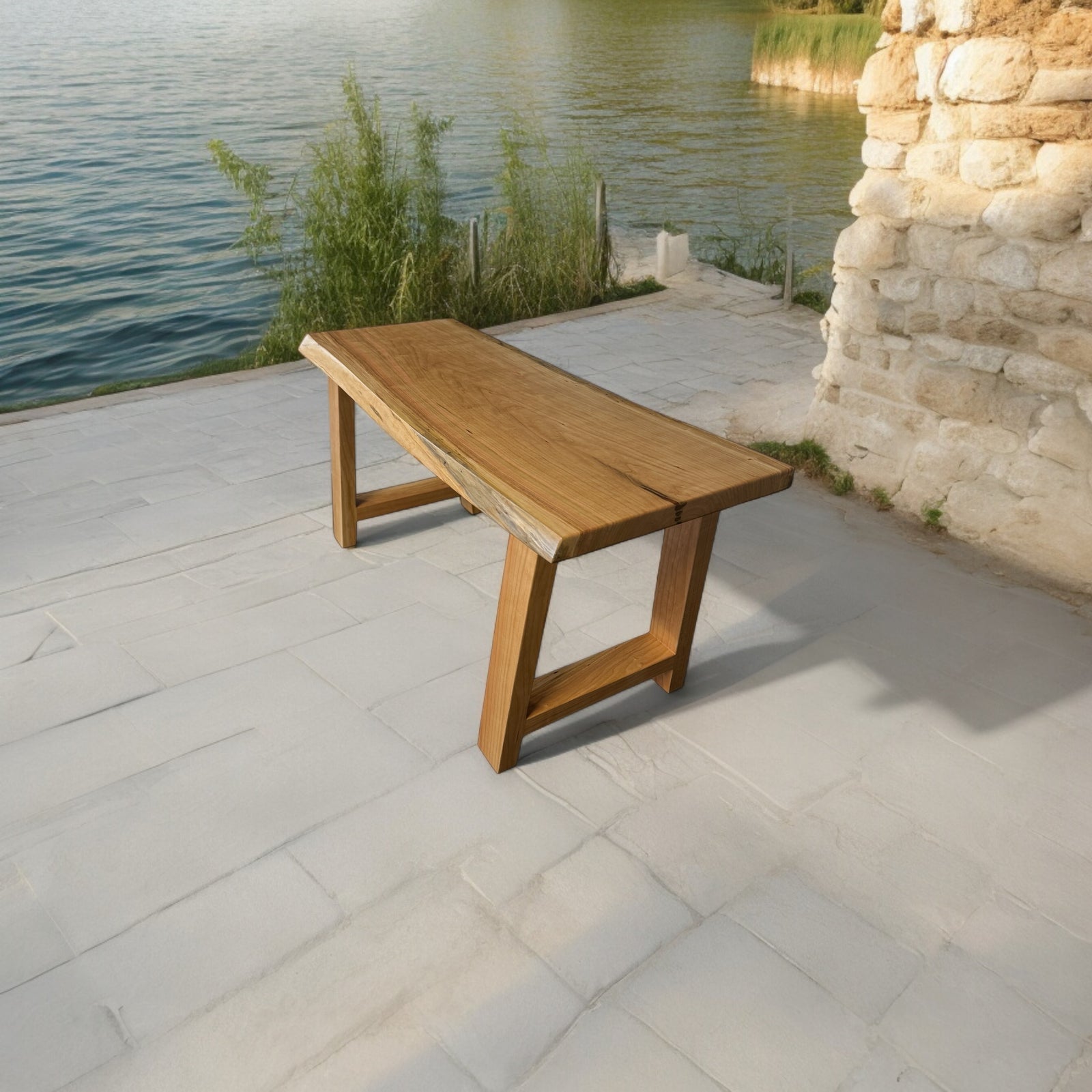 Live Edge Cherry Bench on a stone patio 