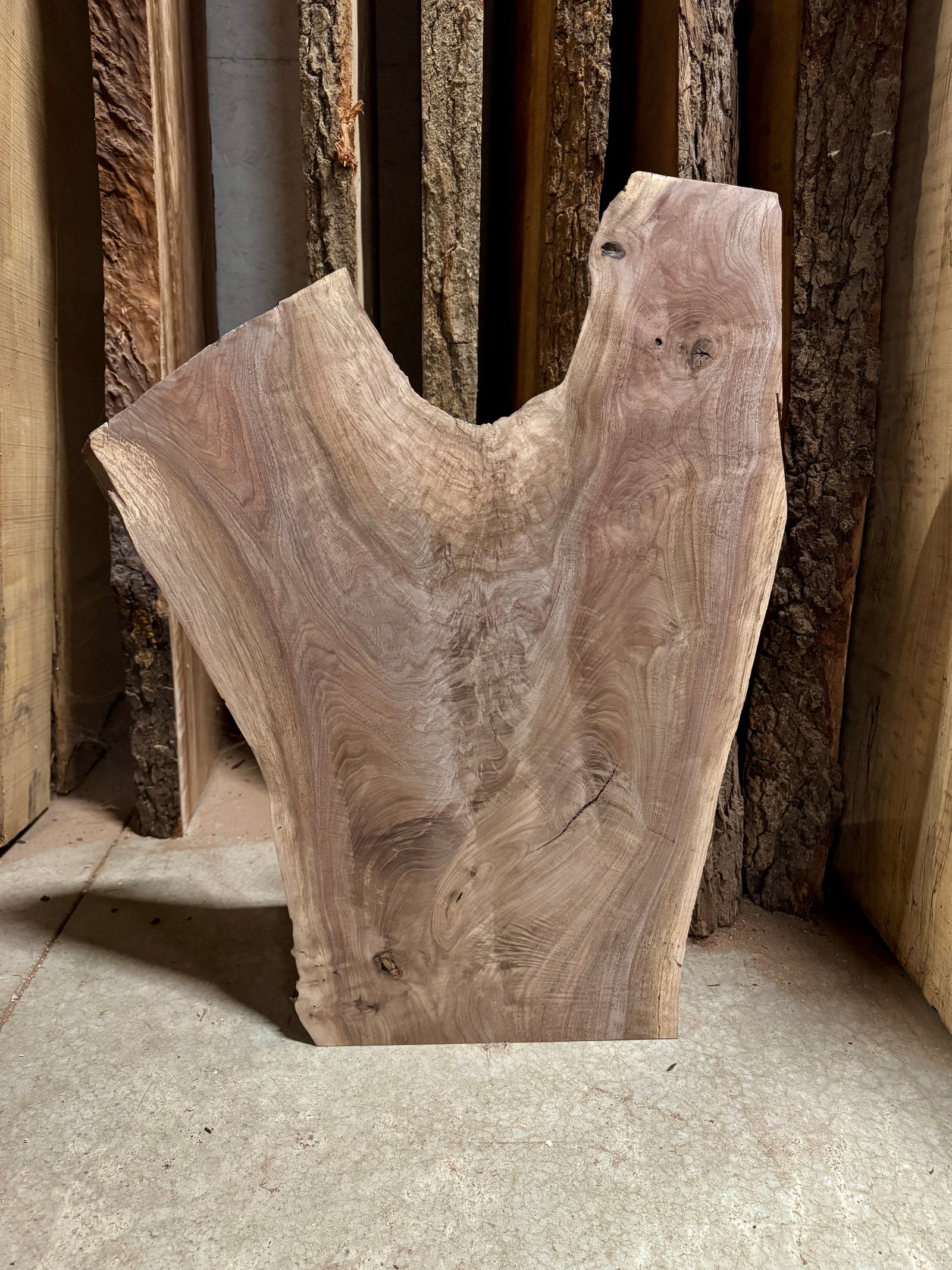 Live edge walnut slab with crotch figure.