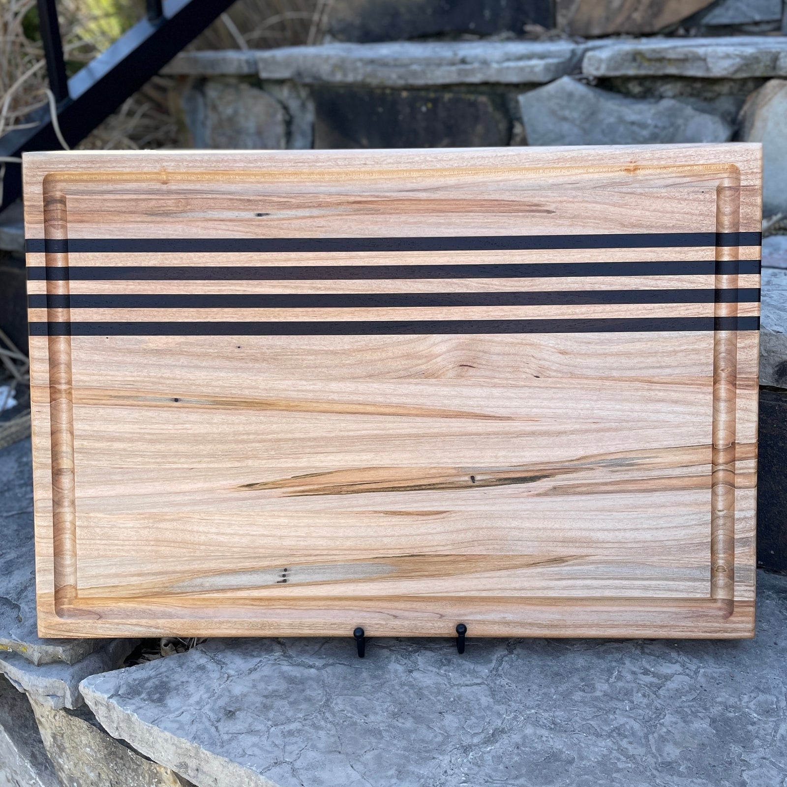 Large Figured maple and wenge wood cutting board.